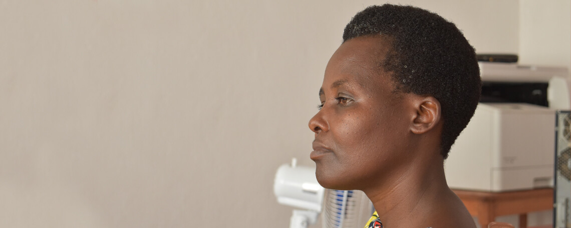 a woman sitting in profile