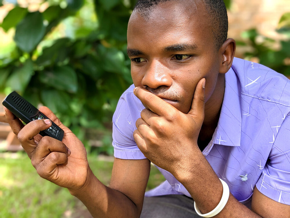 A young man listens to an Audio Bible